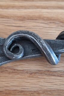 Tendril bottle opener